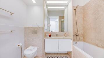 Hair dryer, bidet, towels, soap