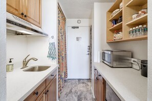 Fridge, microwave, stovetop, coffee/tea maker