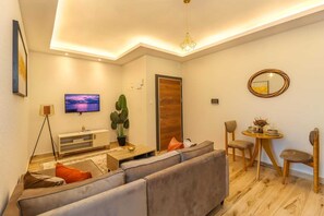 Departamento clásico, vista a la ciudad | Sala de estar