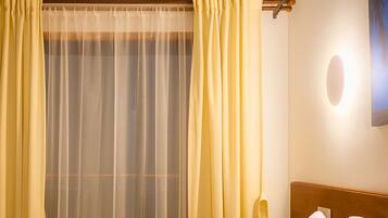 Standard Room | In-room safe, blackout curtains, soundproofing, iron/ironing board