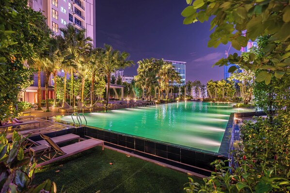Outdoor pool, open 8:00 AM to 10:00 PM, sun loungers