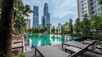 Outdoor pool, open 8:00 AM to 10:00 PM, pool loungers