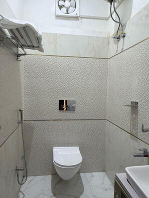 Shower, free toiletries, towels, soap