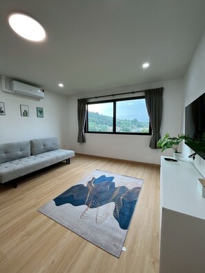 Kamar Quadruple Premier | Area keluarga | TV