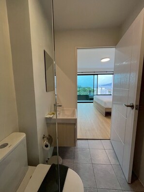 Premier Quadruple Room | Bathroom | Hair dryer, bathrobes, soap, shampoo