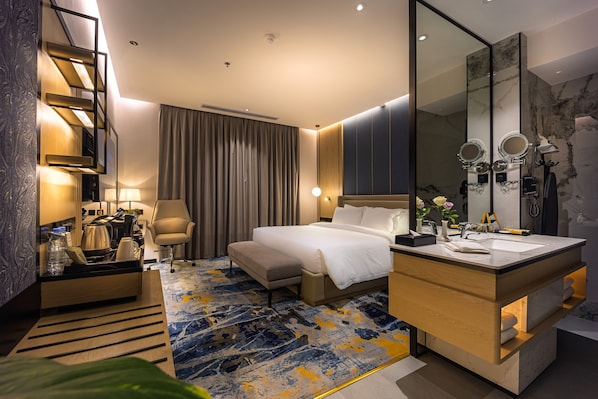 Premium bedding, memory-foam beds, in-room safe, desk