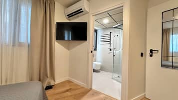 Habitación Deluxe doble, vistas a la ciudad | Sábanas de algodón egipcio y ropa de cama de alta calidad