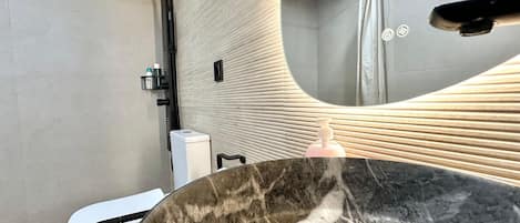 Deluxe Double Room, City View | Bathroom | Shower, rainfall showerhead, hair dryer, towels