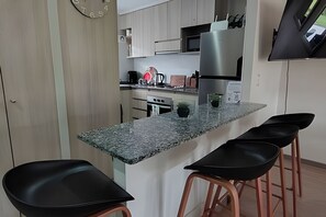 Family Apartment, Balcony, Courtyard View | Private kitchen