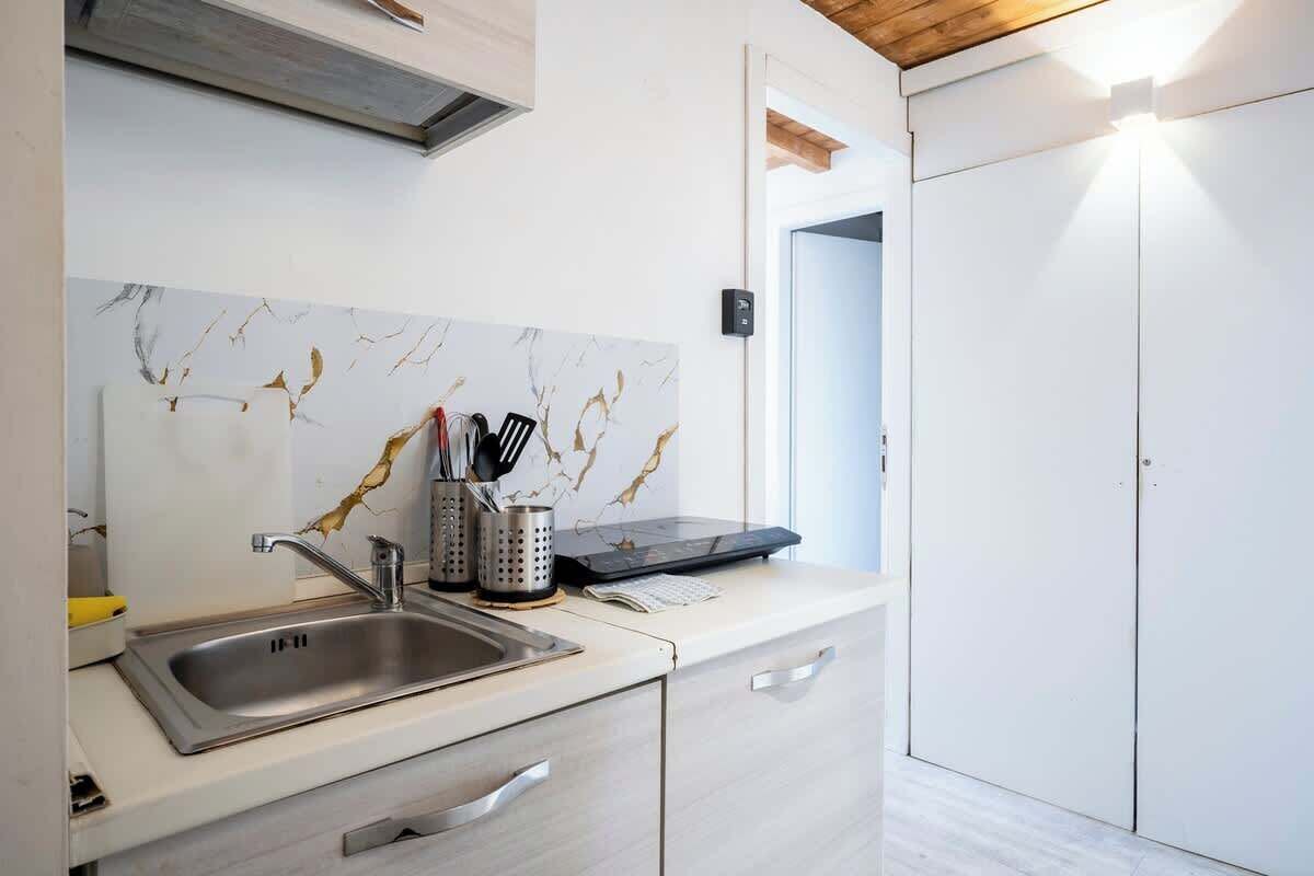 Fridge, microwave, stovetop, cookware/dishes/utensils