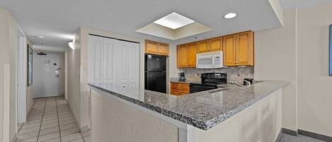 Condo, 3 Bedrooms | Private kitchen | Fridge, oven, coffee/tea maker, toaster
