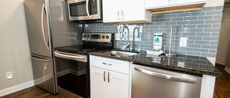 Condo, 1 Bedroom | Private kitchen | Fridge, oven, coffee/tea maker, toaster