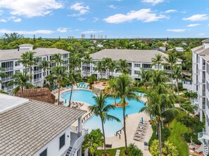 Outdoor pool, a heated pool - Tranquil 2-bedroom condo, resort pool,2 miles to beach (Bonita Springs)