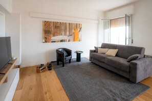 Chambre Double Confort | Coin séjour