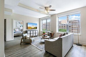 Family Condo, 4 Bedrooms | Living room | 50-inch Smart TV with digital channels, foosball