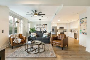 Senior Condo, 4 Bedrooms | Living room | 50-inch Smart TV with digital channels, foosball - California Building (New Orleans)