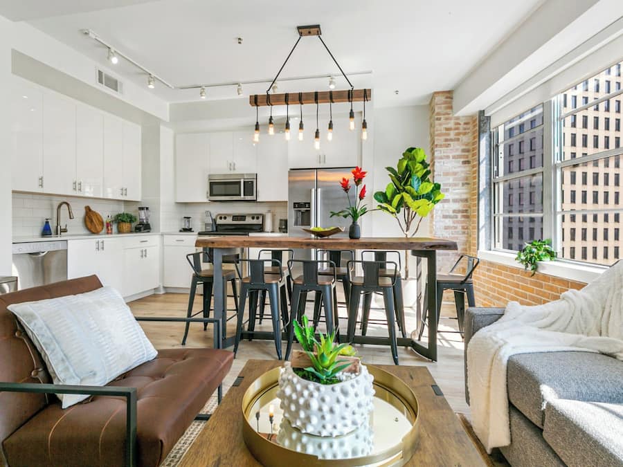 Premium Condo, 4 Bedrooms | Living room | 50-inch Smart TV with digital channels, table football