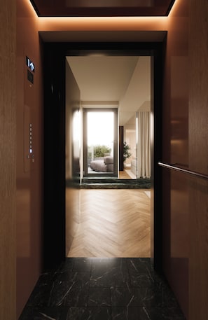 Suite Deluxe, vista a la ciudad | Tabla de planchar con plancha y wifi gratis