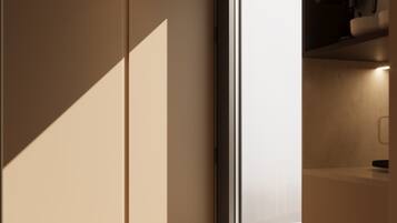 Suite Deluxe, vista città | Ferro/asse da stiro, Wi-Fi gratuito