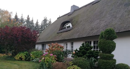 Ferienhaus 'Haus Am See' mit privater Terrasse, privatem Garten und WLAN