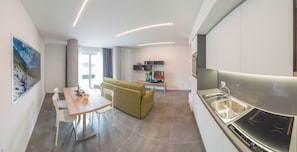 Comfort Apartment, Patio, Pool View | Living area