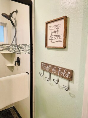 Shower, hair dryer, towels, soap