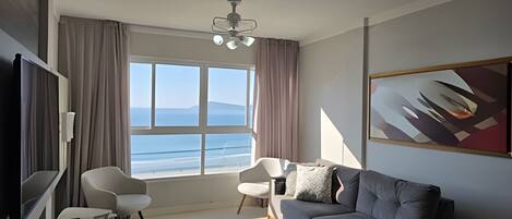Apartment | Living area | 50-inch Smart TV with digital channels, Netflix, streaming services