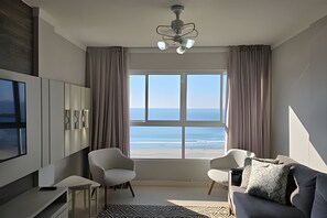 Apartamento | Área de estar | Smart TV 50 polegadas com canais digitais, Netflix