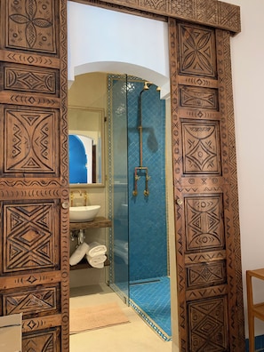 Triple Room | Bathroom | Shower, hair dryer, towels, soap