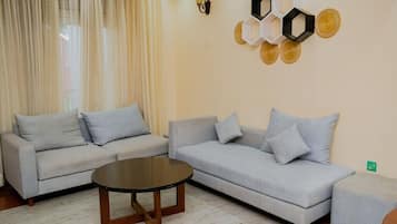 Suite familiar | Área de sala de estar