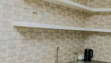 Basic Room, 1 Bedroom, Balcony, Garden View | Private kitchen | Fridge, cleaning supplies, paper towels