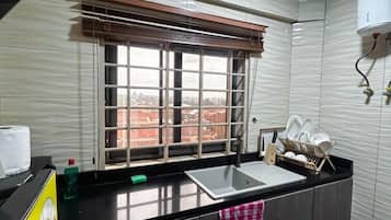 Fridge, microwave, stovetop, cookware/dishes/utensils
