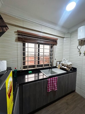 Fridge, microwave, stovetop, cookware/dishes/utensils
