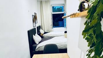 1 habitación y ropa de cama