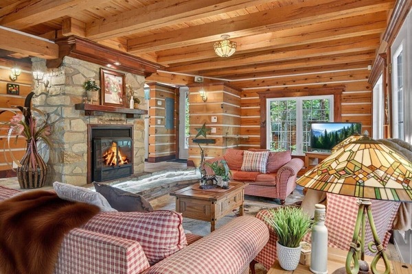 Living room with wood-burning fireplace