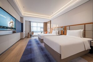 Habitación ejecutiva, 2 camas matrimoniales | Edredón, minibar y caja de seguridad en la habitación 