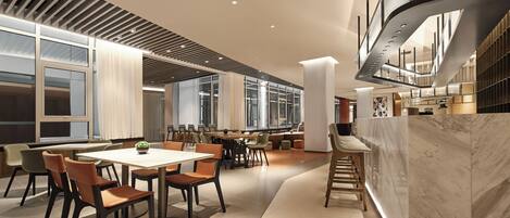 A modern interior with a dining area, kitchen, and bar/lounge area.