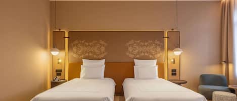 Ropa de cama de alta calidad y minibar