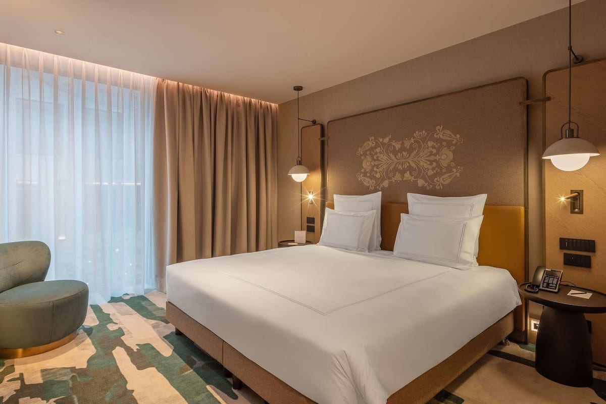 Junior Suite, 1 King Bed (Atrium View) | Premium bedding, minibar, in-room safe, desk