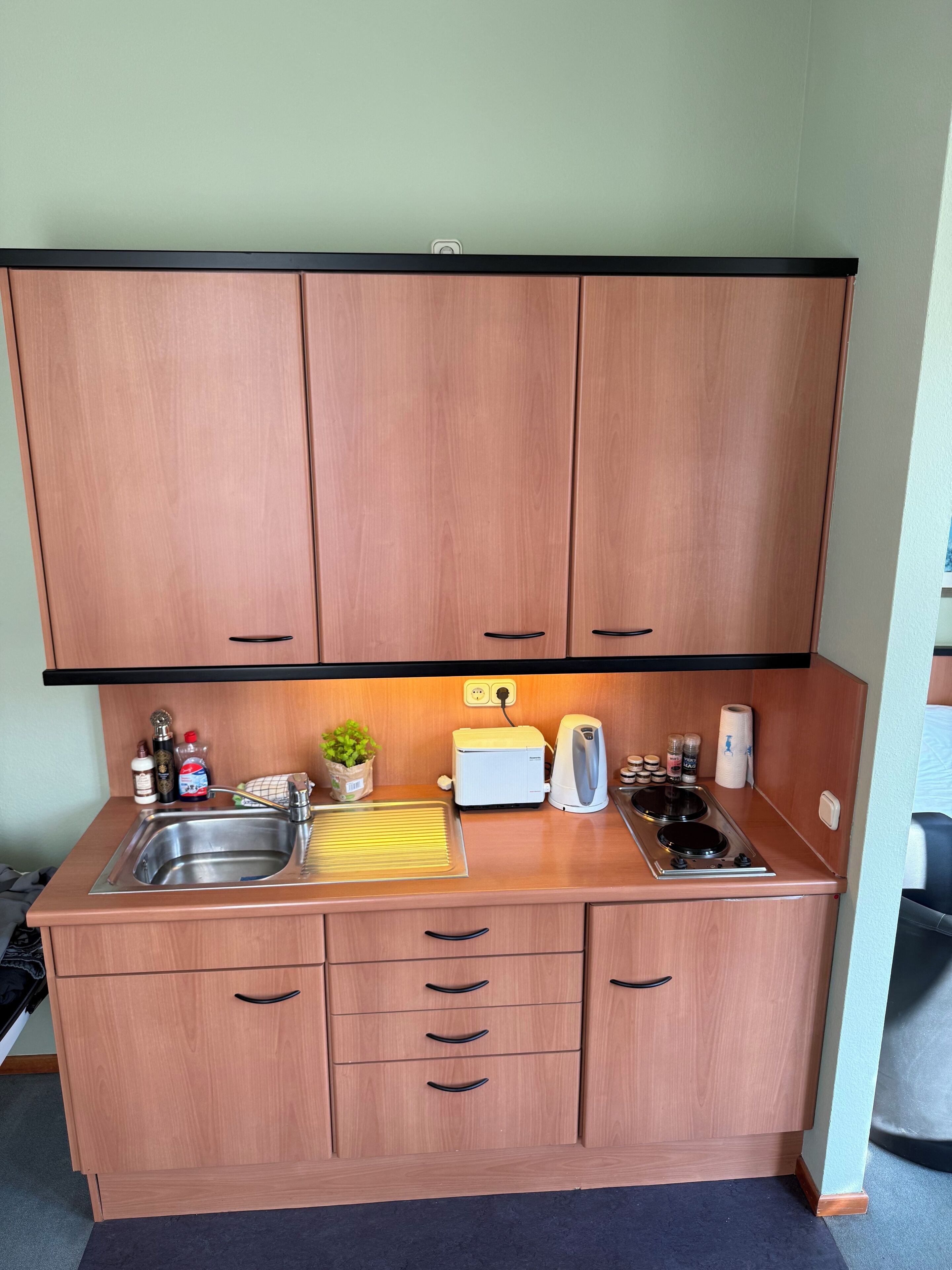 Fridge, stovetop, electric kettle, toaster