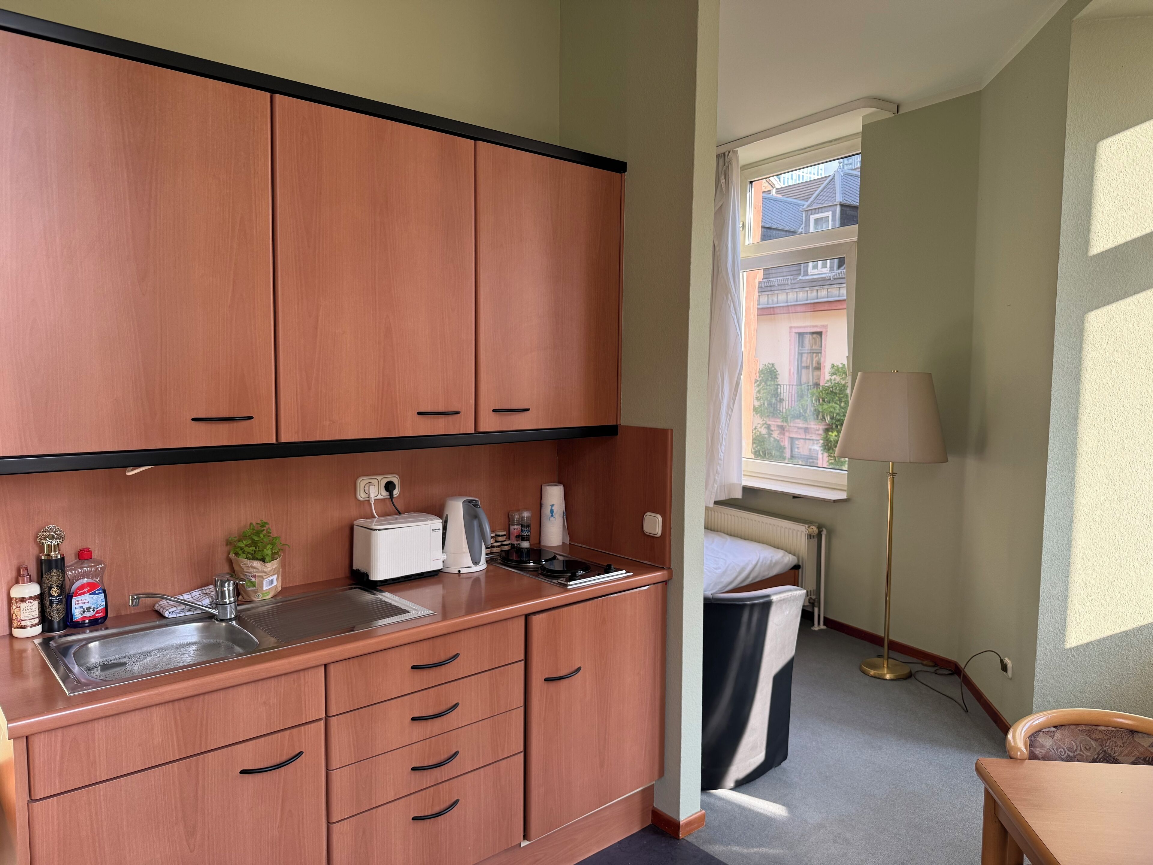 Fridge, stovetop, electric kettle, toaster