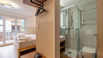Deluxe Studio, Balcony, Mountain View | Bathroom | Shower, hair dryer, towels, soap