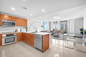 Condo, Balcony, City View | Private kitchen | Coffee/tea maker, electric kettle, toaster, blender - Midtown Miami Condo with Free Parking (Miami)