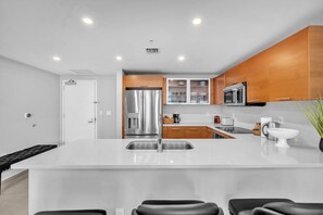 Condo, Balcony, City View | Private kitchen | Coffee/tea maker, electric kettle, toaster, blender - Midtown Miami Condo with Free Parking (Miami)