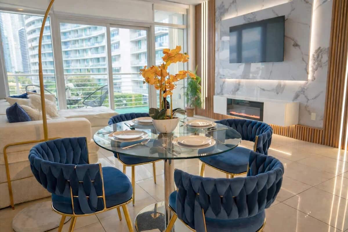 Deluxe Apartment, Balcony, City View | Living area | 50-inch plasma TV with cable channels