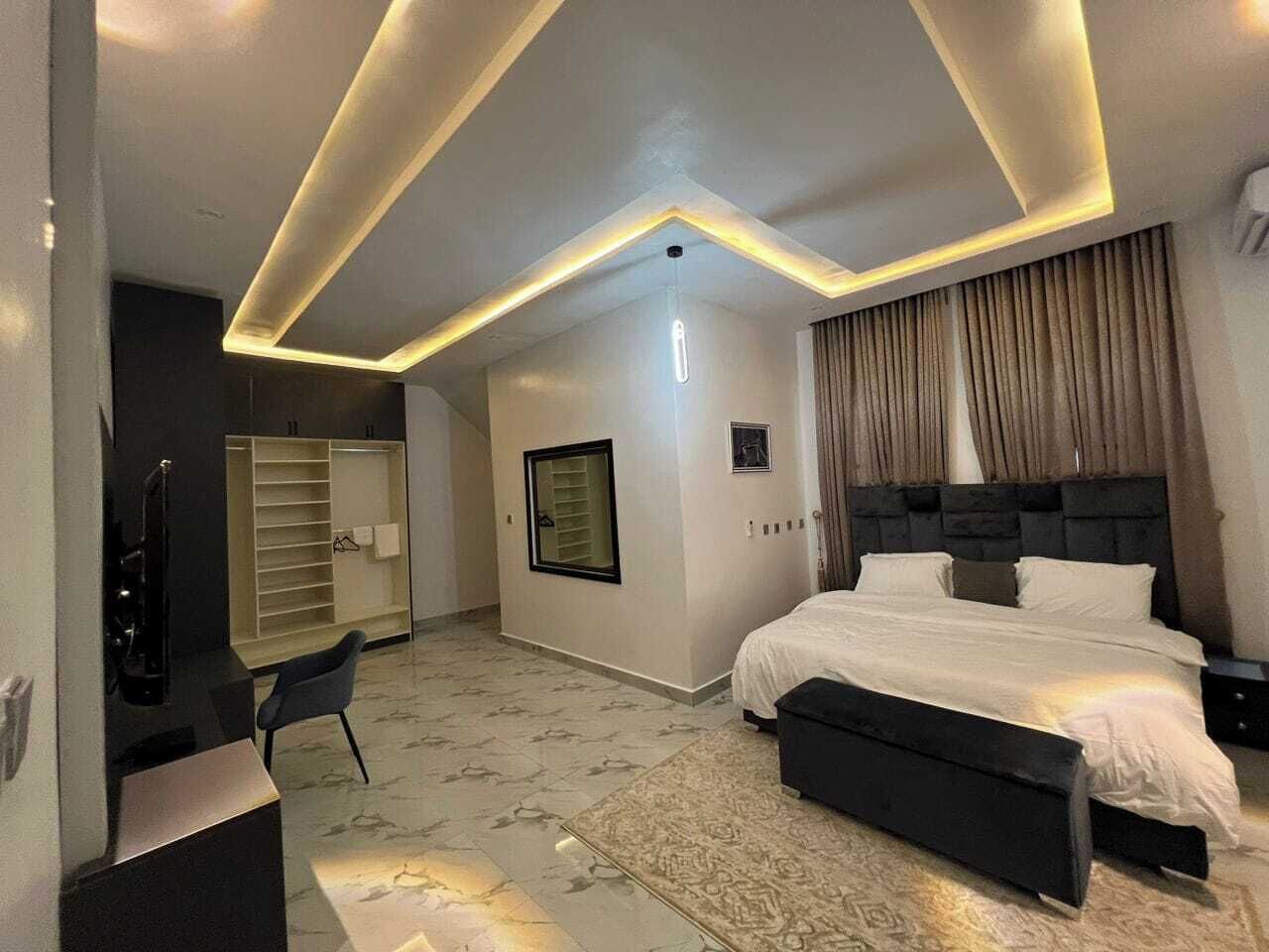 Deluxe Apartment, Balcony, City View | Desk, laptop workspace, blackout drapes, soundproofing