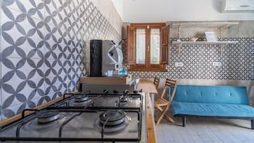 Fridge, stovetop, coffee/tea maker, high chair