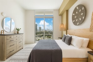 Luksushuoneisto, valtamerinäköala | Memory foam -patjalliset sängyt, tallelokero huoneessa, työpöytä