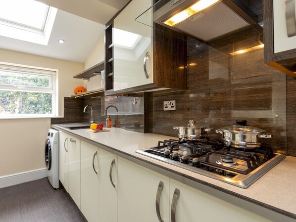 Fridge, microwave, dishwasher, coffee/tea maker