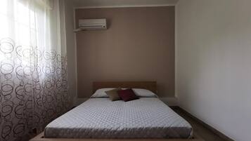 1 chambre, fer et planche Ă repasser, Wi-Fi, draps fournis